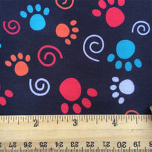 Load image into Gallery viewer, footprint paw paint splatter black series swirls printed fabric
